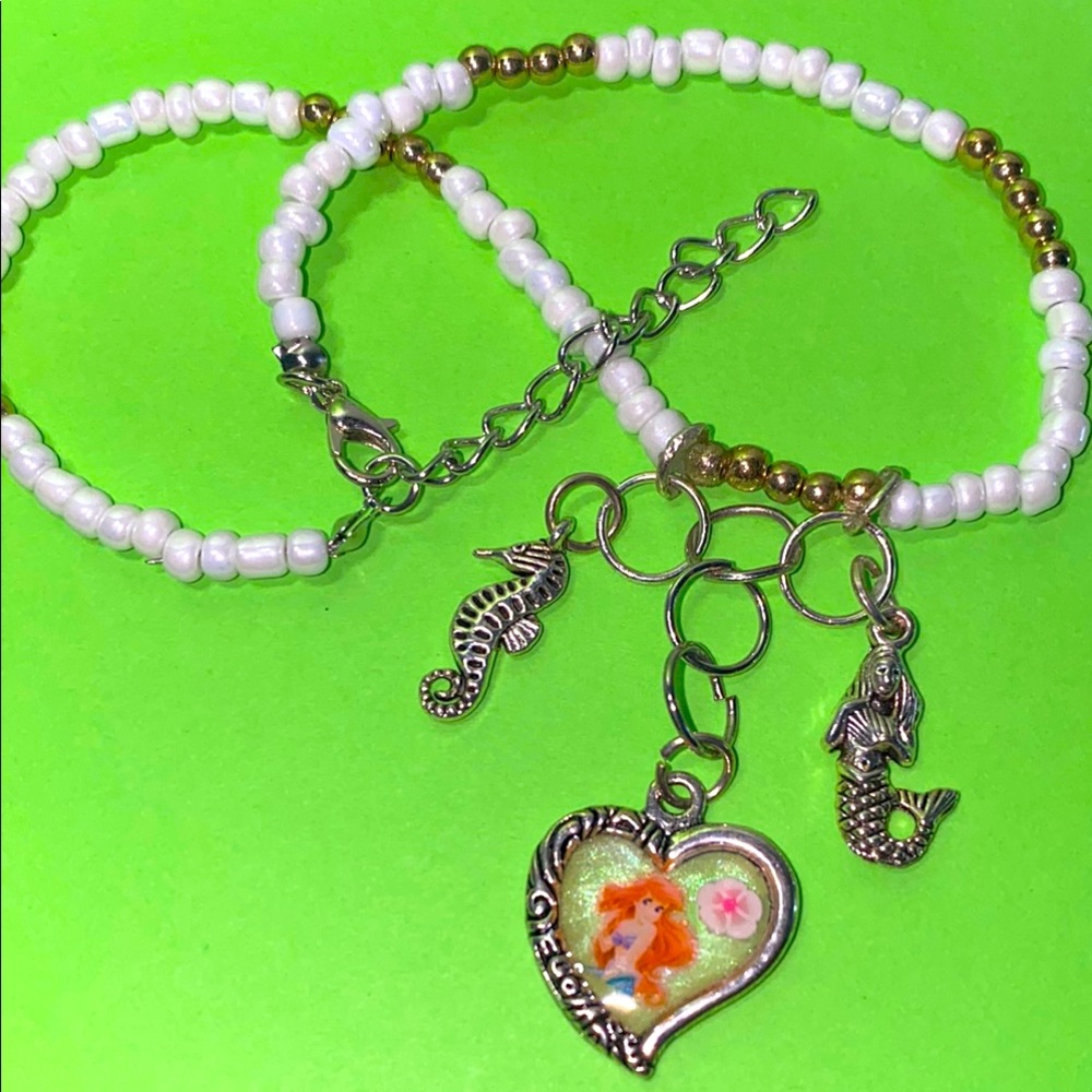 White and Gold Beaded Necklace with a Princess